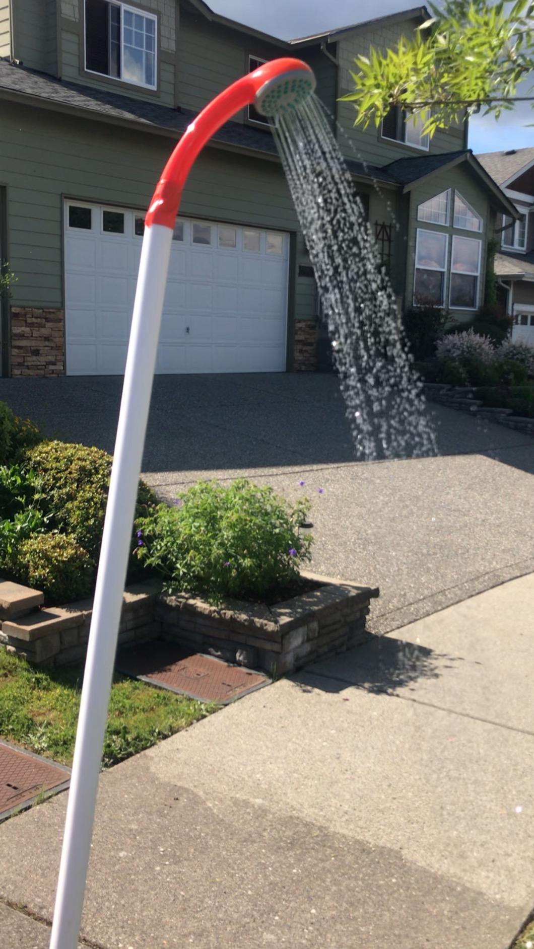 Ivation Portable Outdoor Shower, Battery Powered - Compact Handheld Rechargeable Camping Showerhead - Pumps Water from Bucket Into Steady, Gentle Shower Stream - Customer Photo 5