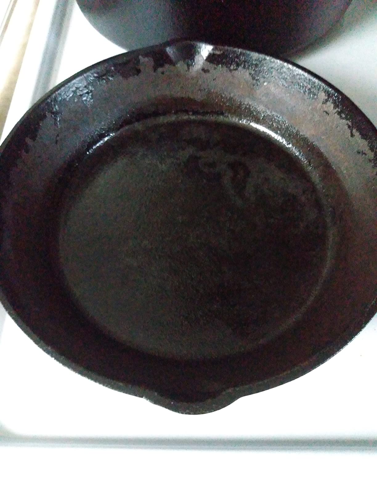 Amazon Basics Pre-Seasoned Cast Iron 5 Pieces Kitchen Pots and Pans Cookware Set, Black, 14.17 x 12.2 x 10.63 in - Customer Photo 3